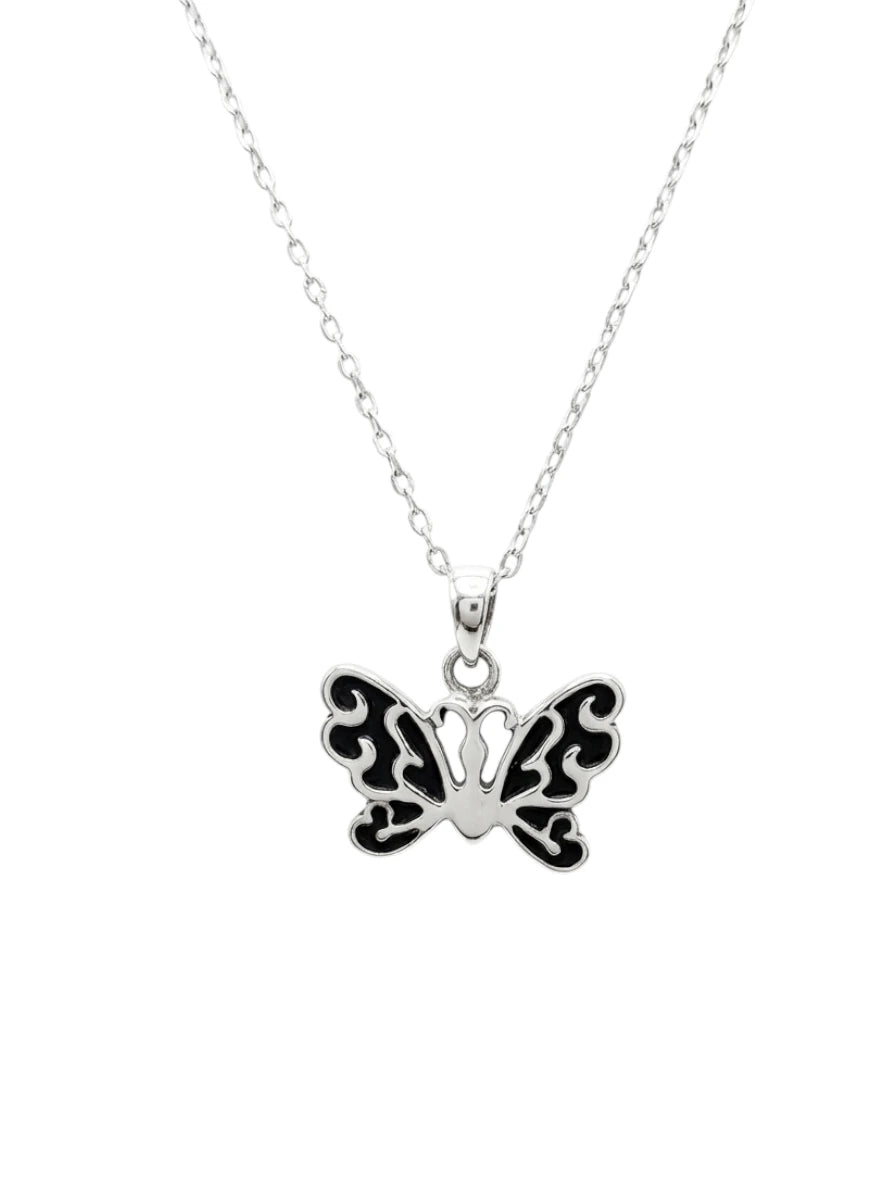 Mariposa en plata quemada